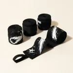 Comet Brushstroke Hand Wraps: two pairs, rolled, the ink strokes still in pieces