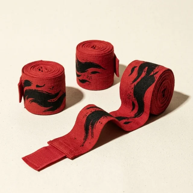 Ember Brushstroke Hand Wraps: two pairs, rolled, the ink strokes still in pieces