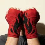 Ember Brushstroke Hand Wraps, wound around both hands so the strokes join into one image
