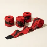 Talon Brushstroke Hand Wraps: two pairs, rolled, the ink strokes still in pieces